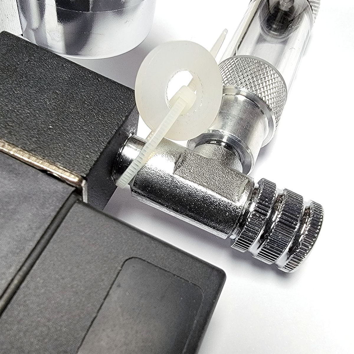 Close up of Reef Crest Bubble Counter and Needle Valve.